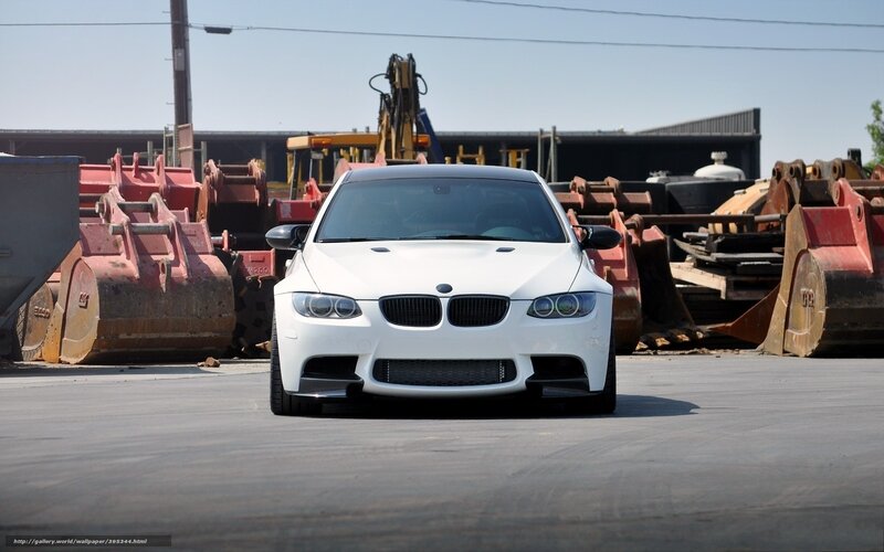 white bmw m3 in junkyard