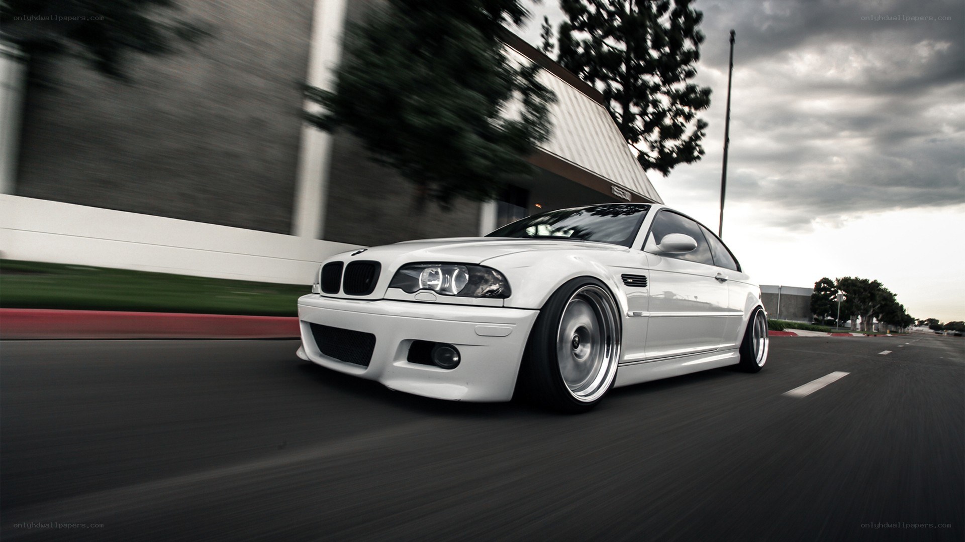 white bmw m3 in motion