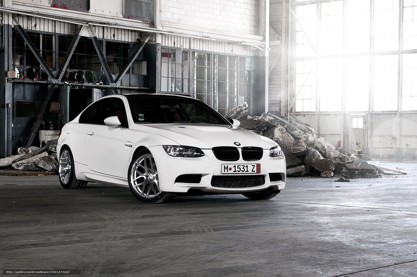 White BMW M3 in warehouse