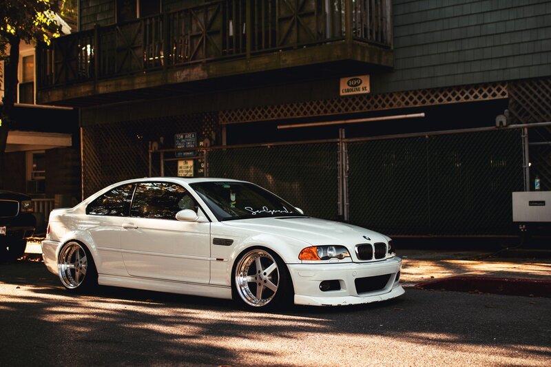 White BMW M3 on a city street