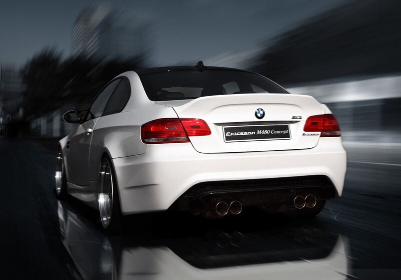 White BMW M3 on a city street
