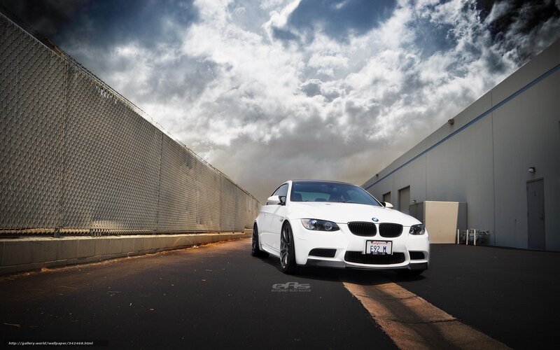 White BMW M3 on a cloudy day