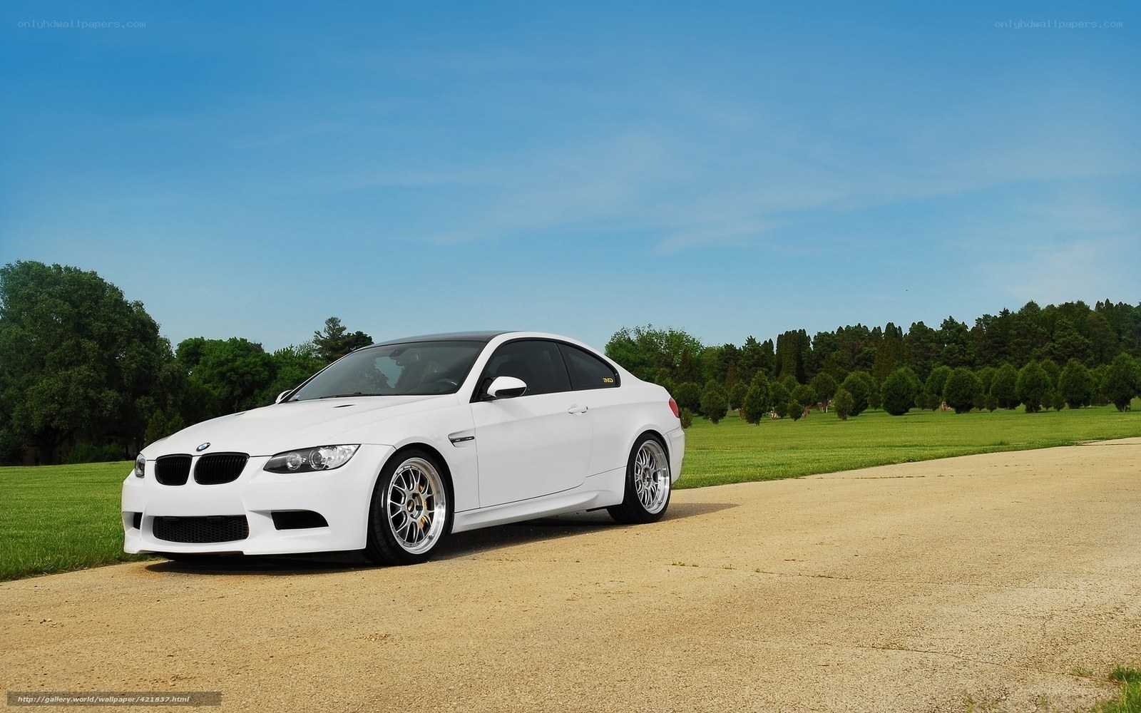 White BMW M3 on a country road