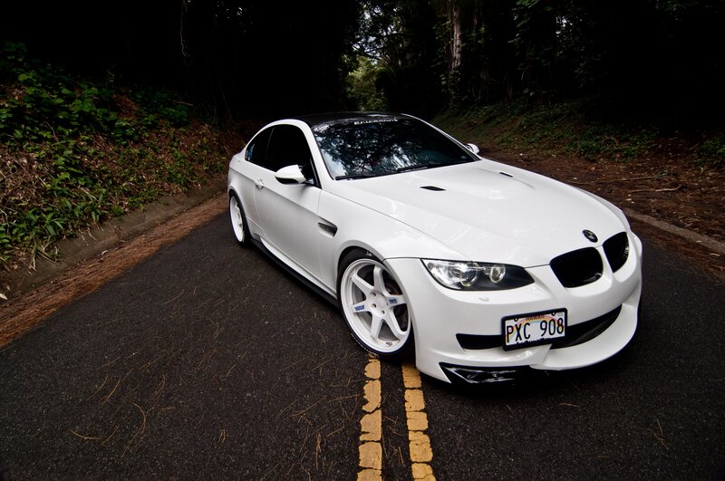 White BMW M3 on a forest road