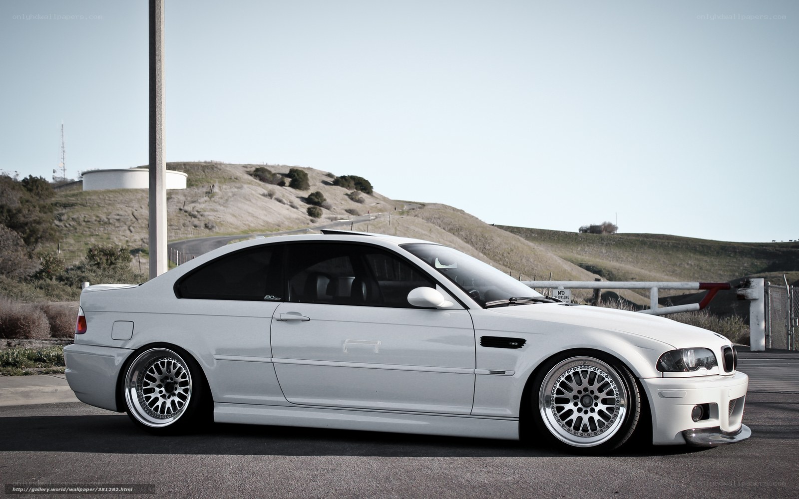 white bmw m3 on a hillside