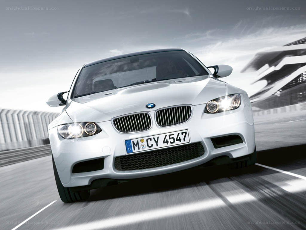 white bmw m3 on a racetrack