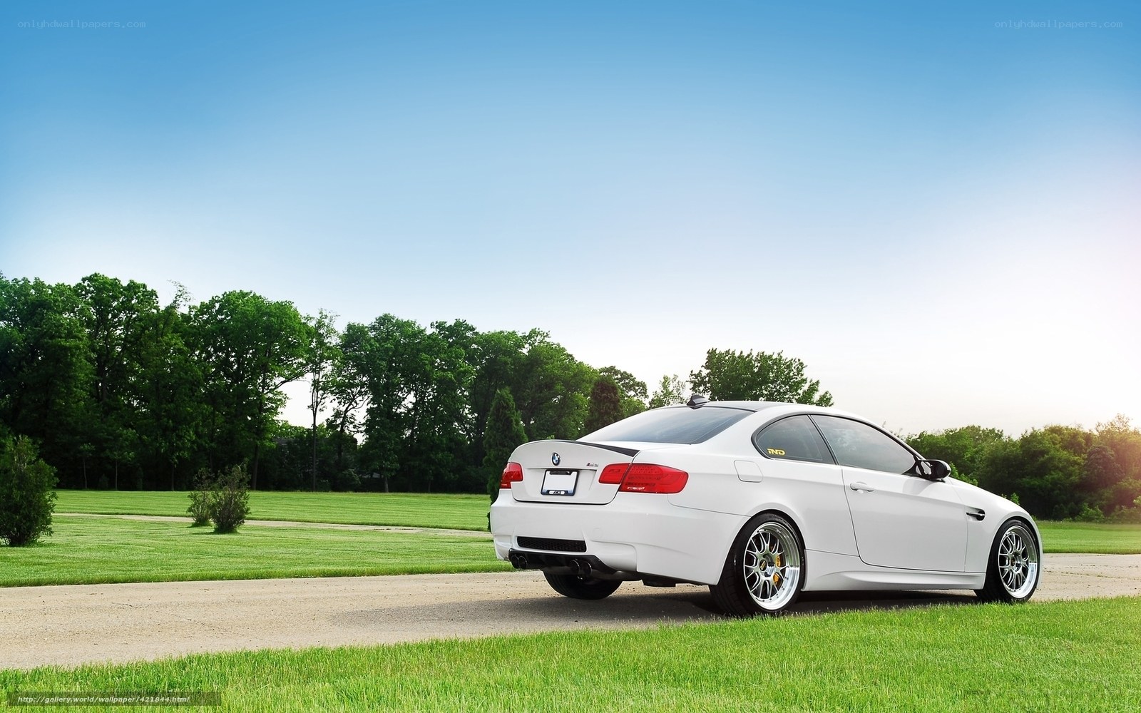 white bmw m3 on a road