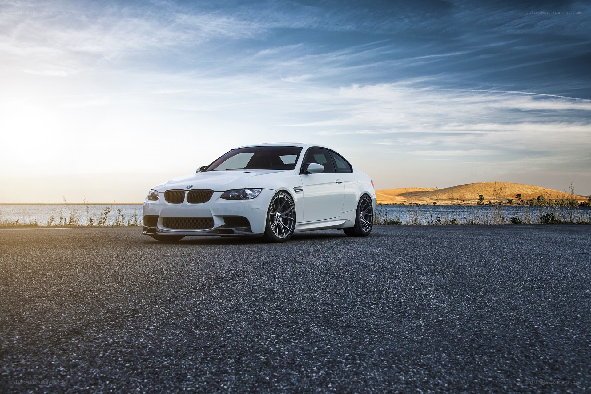 White BMW M3 on asphalt