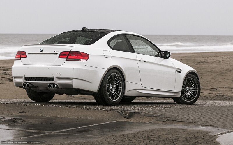 white bmw m3 on beach