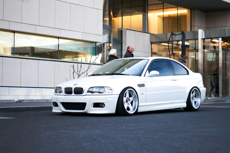 White BMW M3 on city street