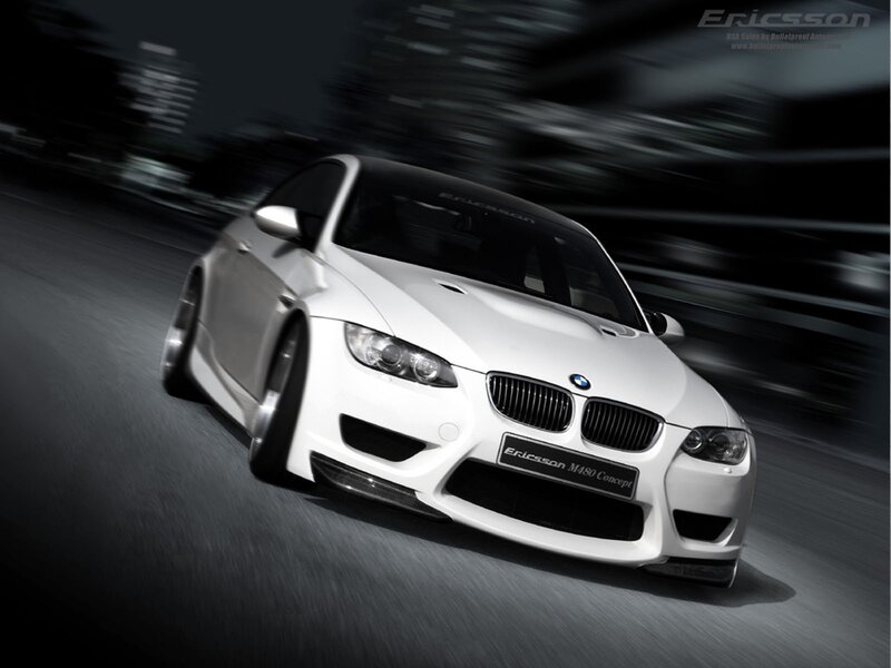 White BMW M3 on city street