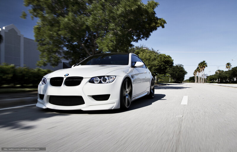 white bmw m3 on city street