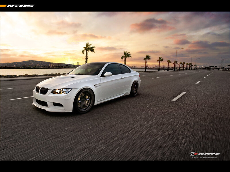 White BMW M3 on coastal road