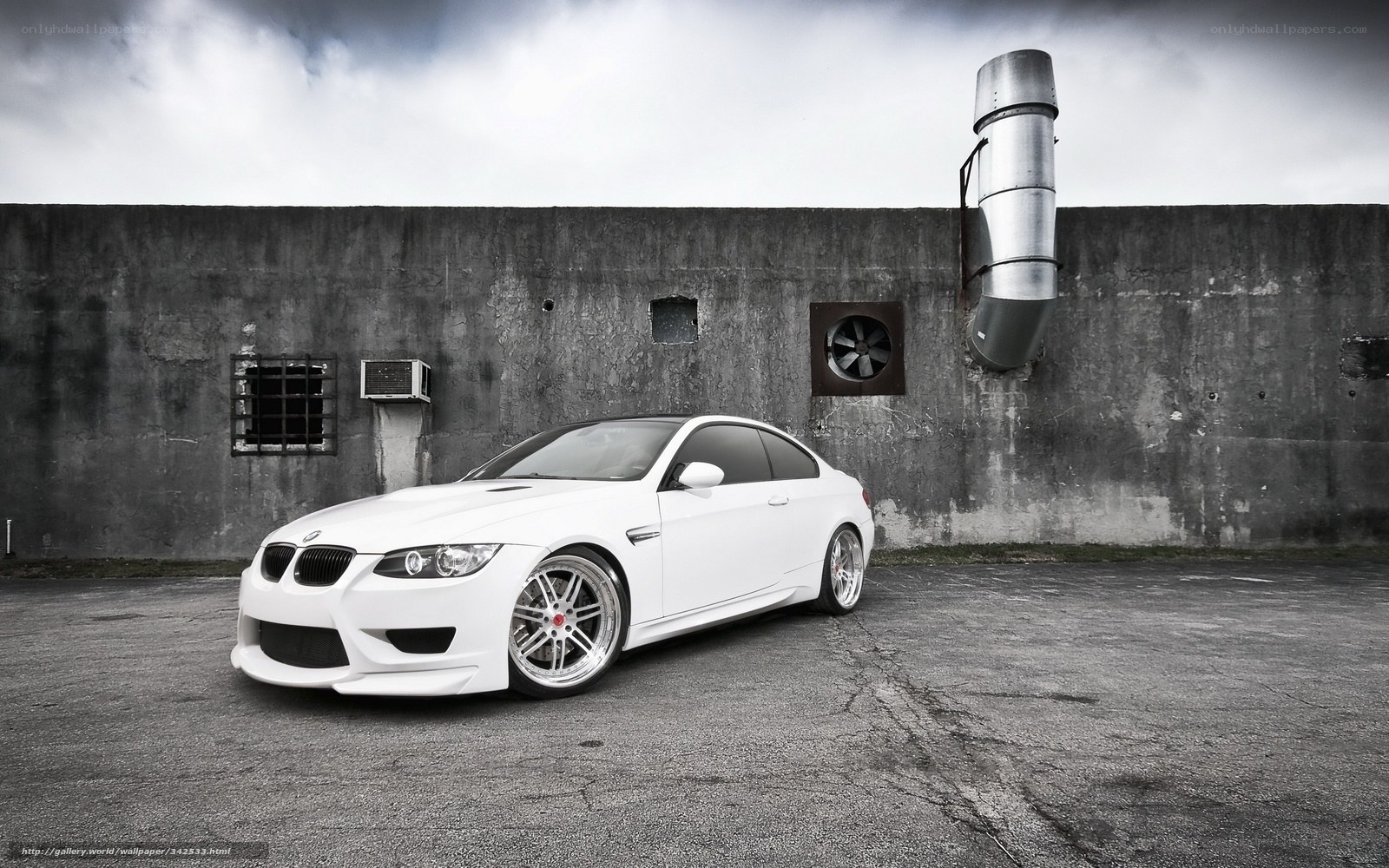 White BMW M3 on concrete