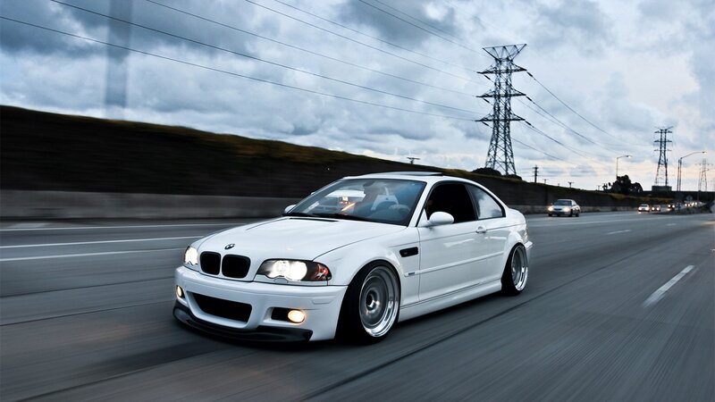 white bmw m3 on highway