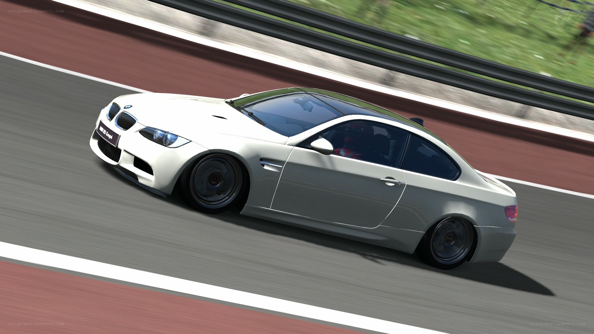 white bmw m3 on racetrack