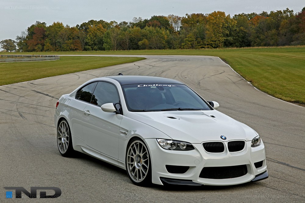 white bmw m3 on racetrack
