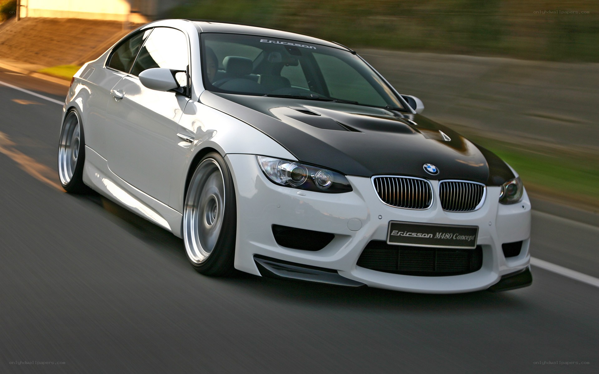 white bmw m3 on road