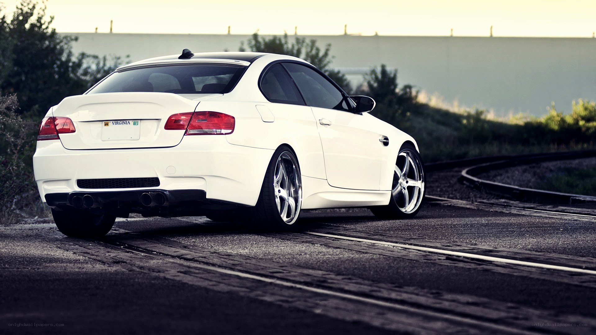 white bmw m3 on road