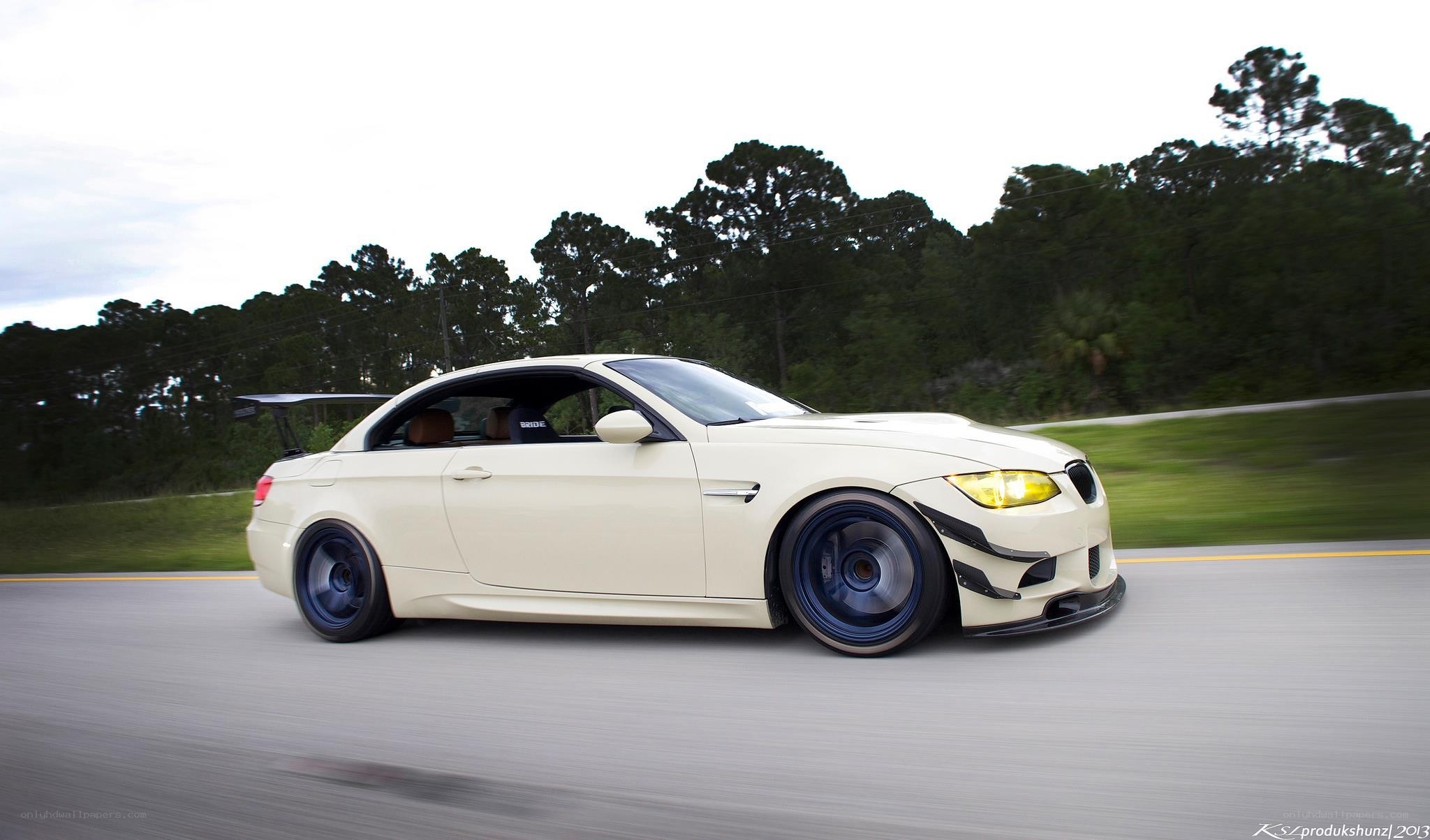 white bmw m3 on road