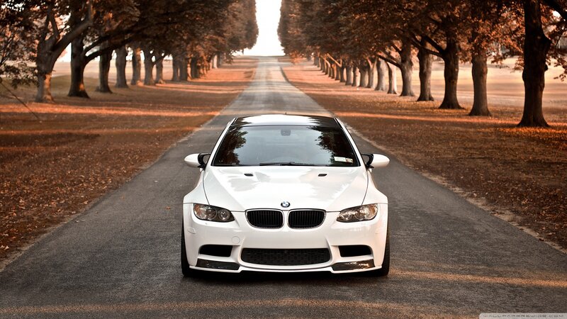 White BMW M3 on Road — Serene