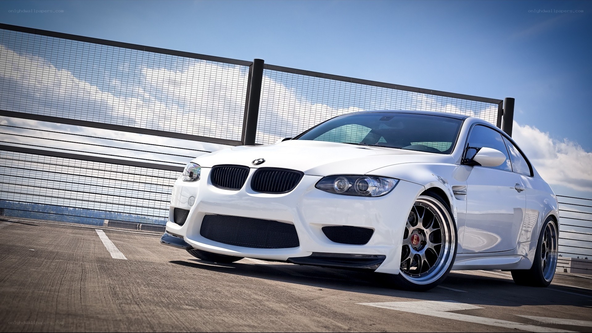 white bmw m3 on rooftop