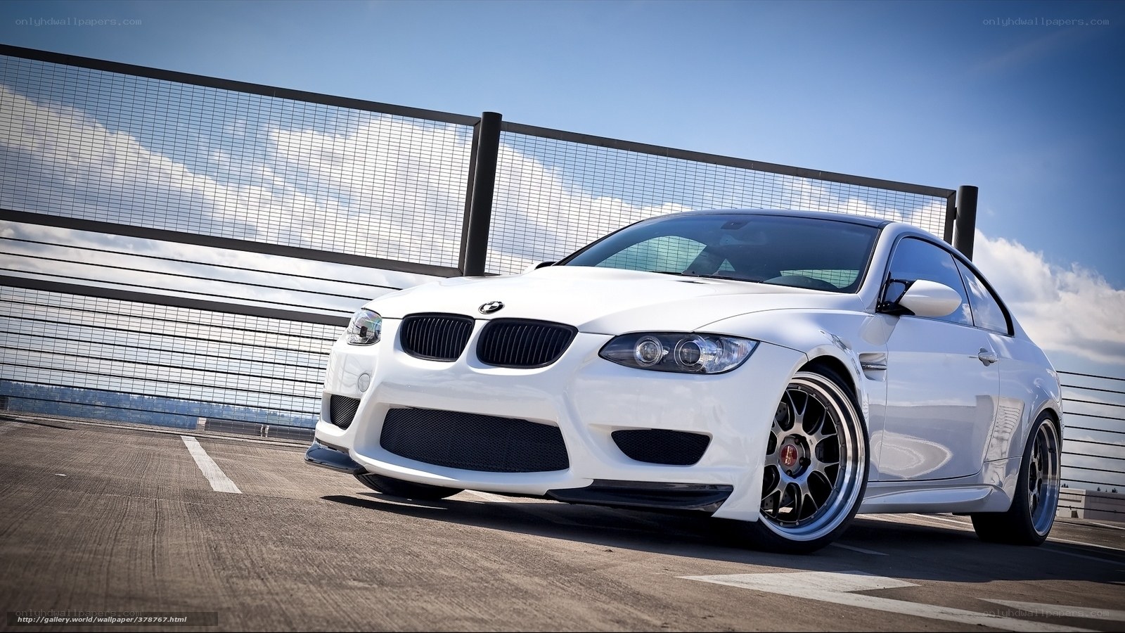 white bmw m3 on rooftop
