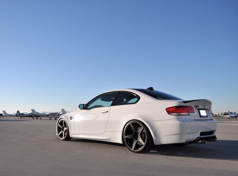 white bmw m3 on tarmac