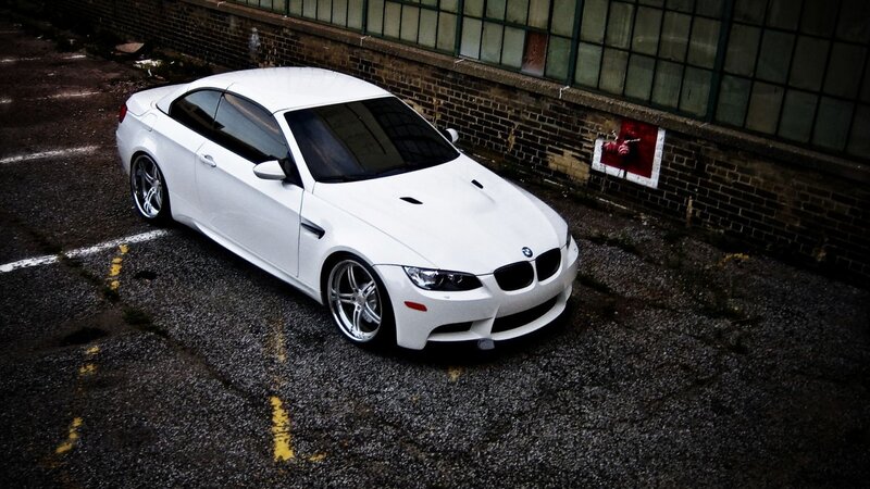 white bmw m3 parked in lot