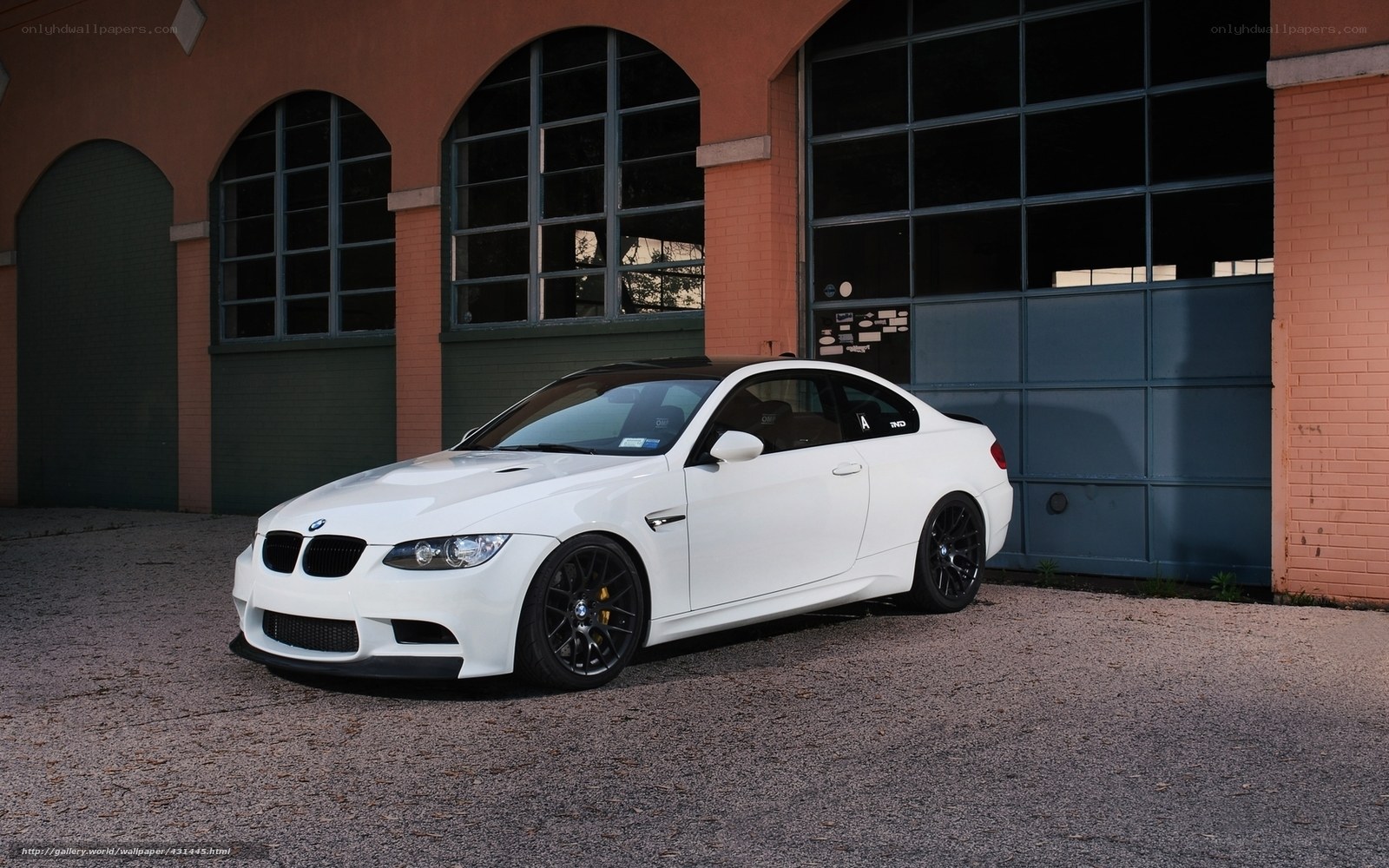 White BMW M3 parked outside