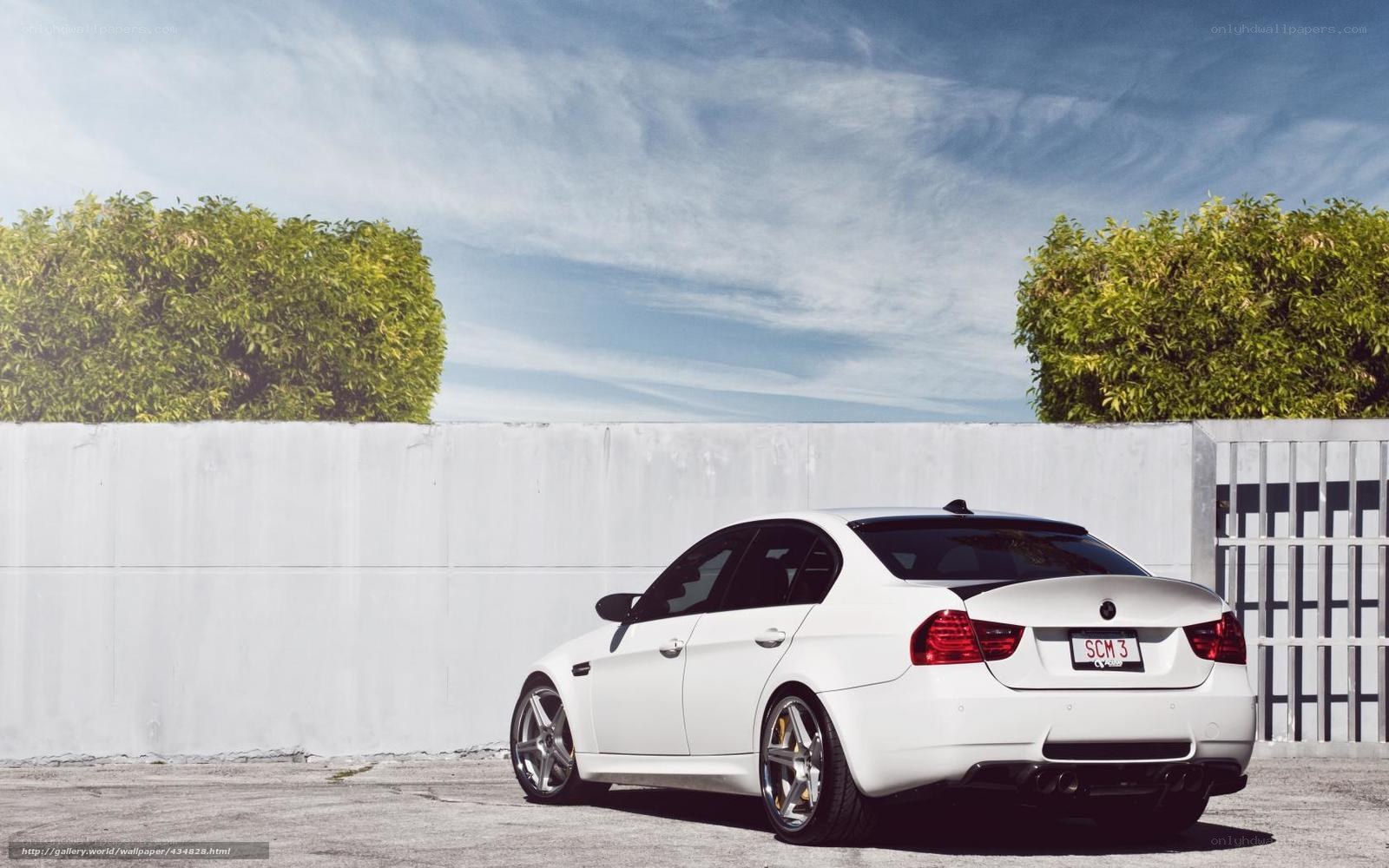 white bmw m3 parked outside