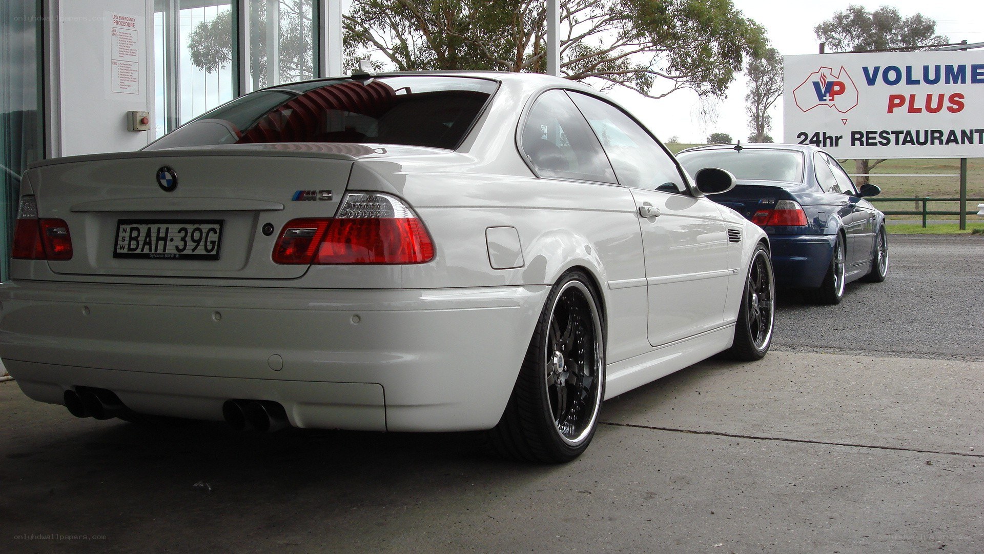 White BMW M3 parked outside