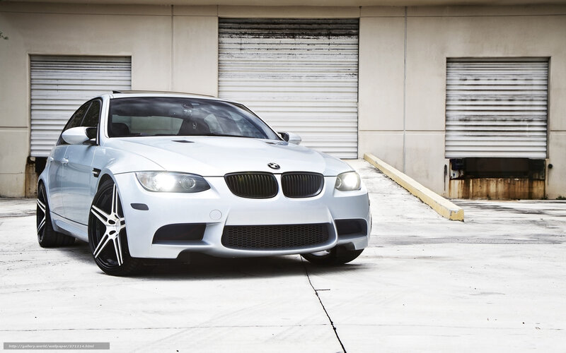white bmw m3 parked outside