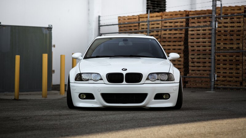 white bmw m3 parked