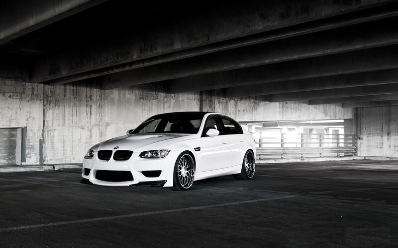 White BMW M3 Sedan — Dramatic, Photograph, Concrete Structure