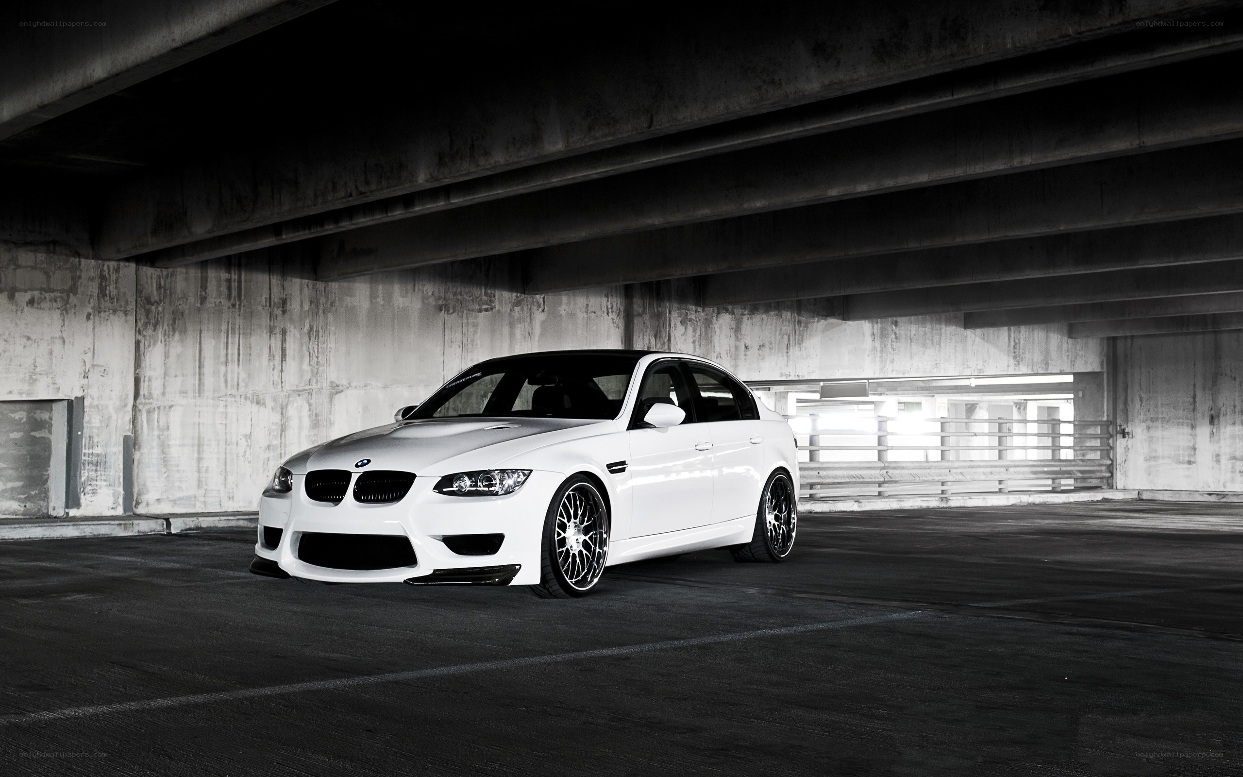 white bmw m3 under overpass