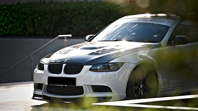 white bmw m3 with carbon hood