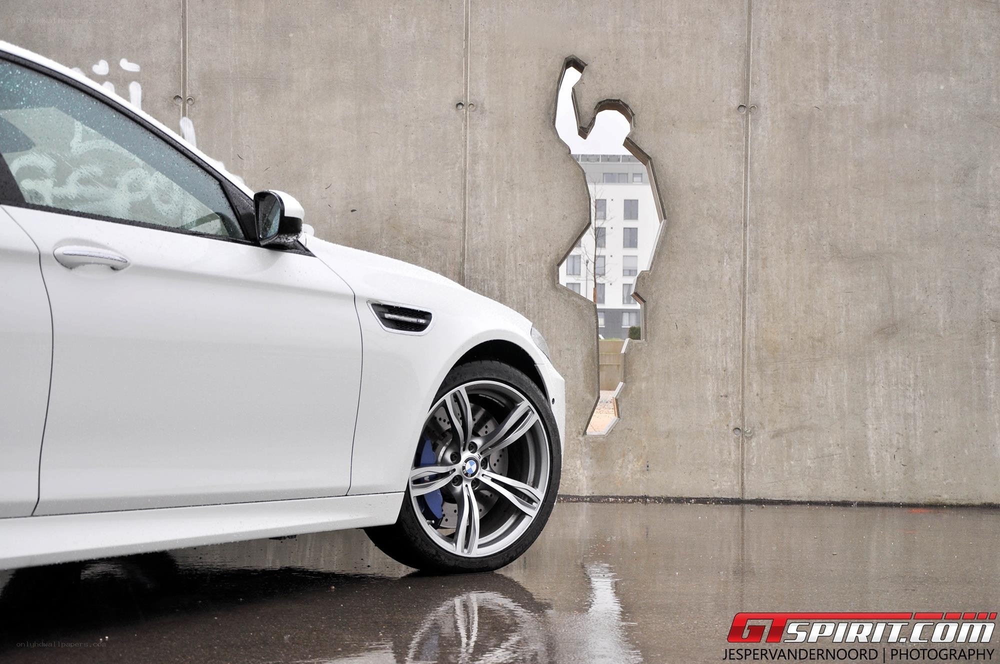 White BMW M3 with custom wall cutout