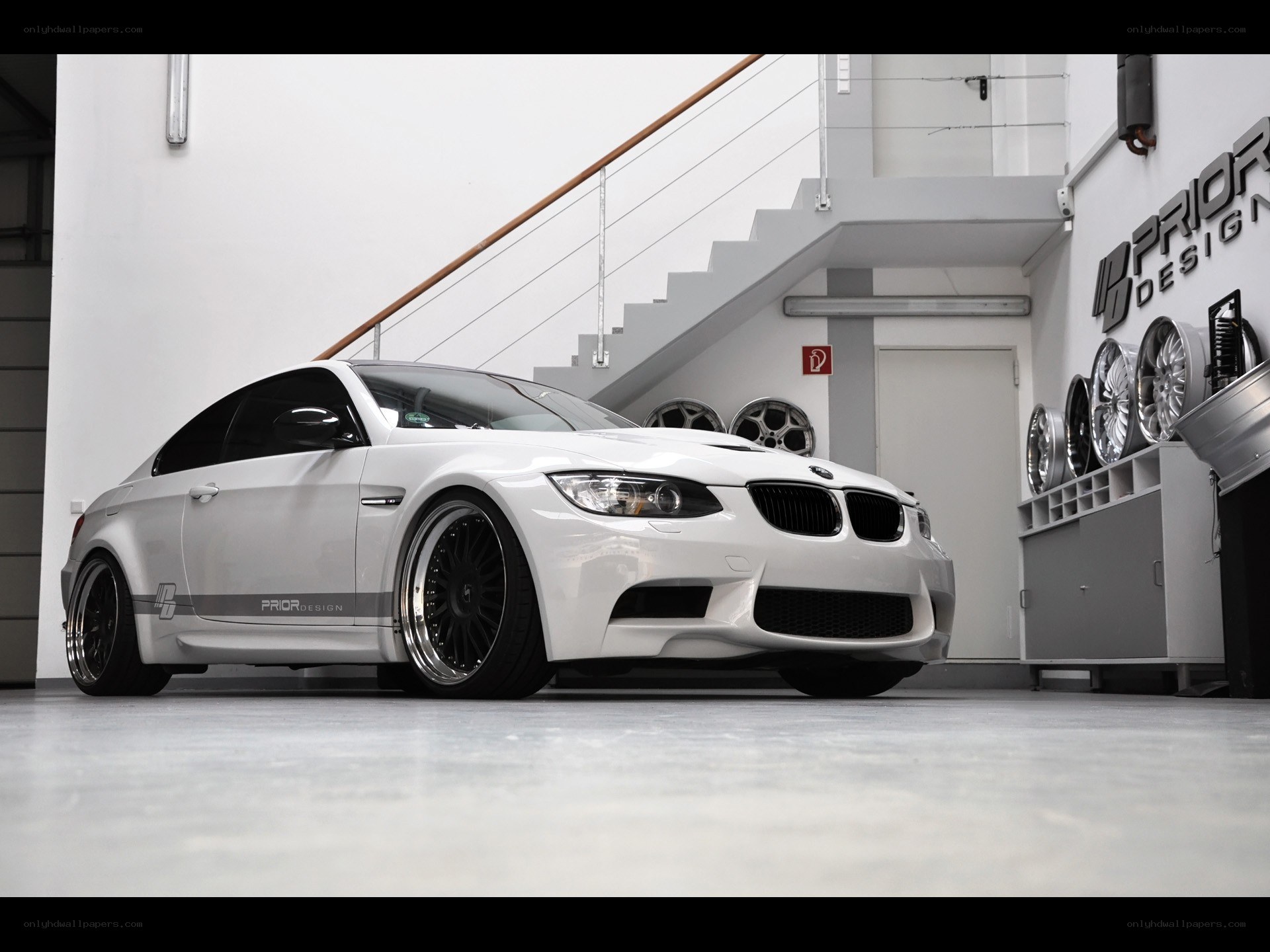 White BMW M3 with custom wheels