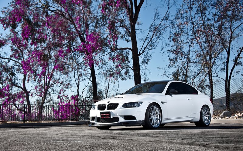 White BMW M3 with purple flowers
