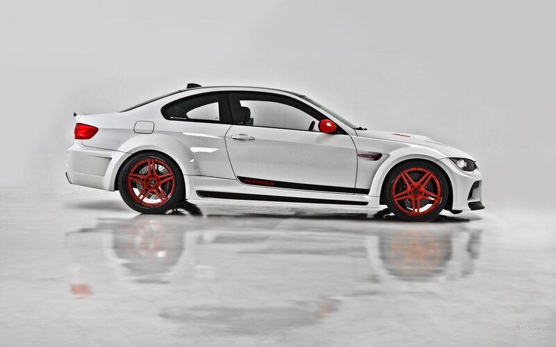 white bmw m3 with red wheels