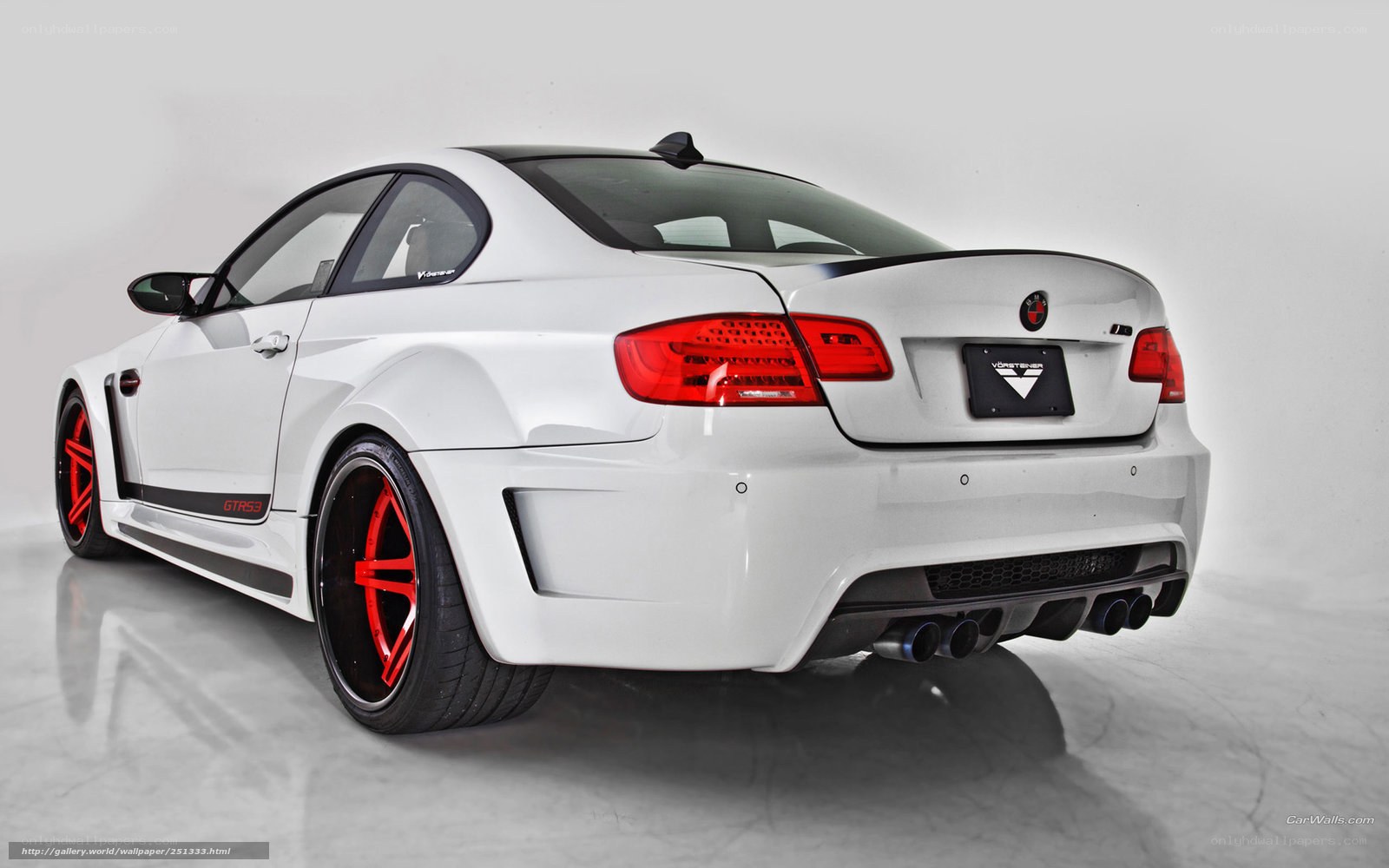 white bmw m3 with red wheels