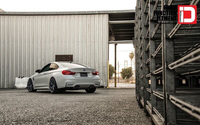 White BMW M4 Coupe — Gray