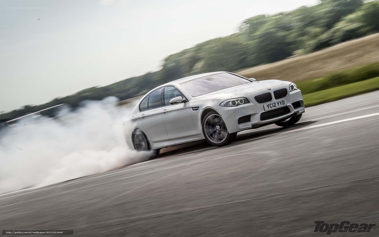 white bmw m5 drifting