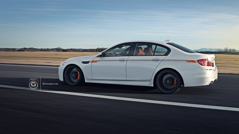 white bmw m5 on track