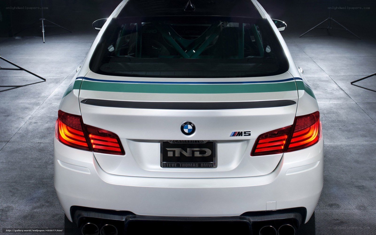 white bmw m5 rear view