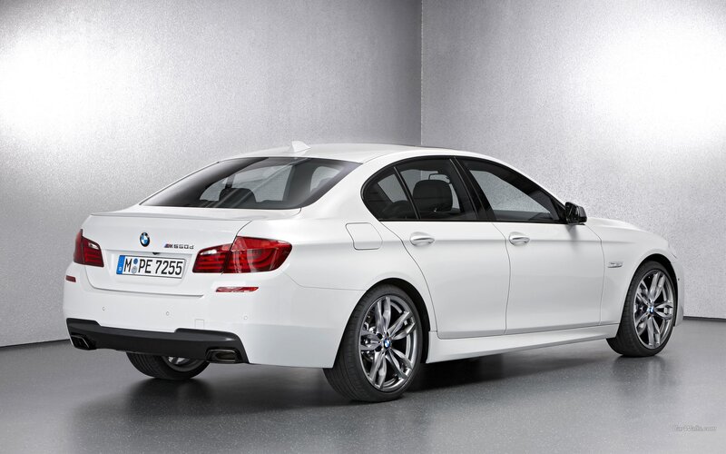 white bmw m5 sedan