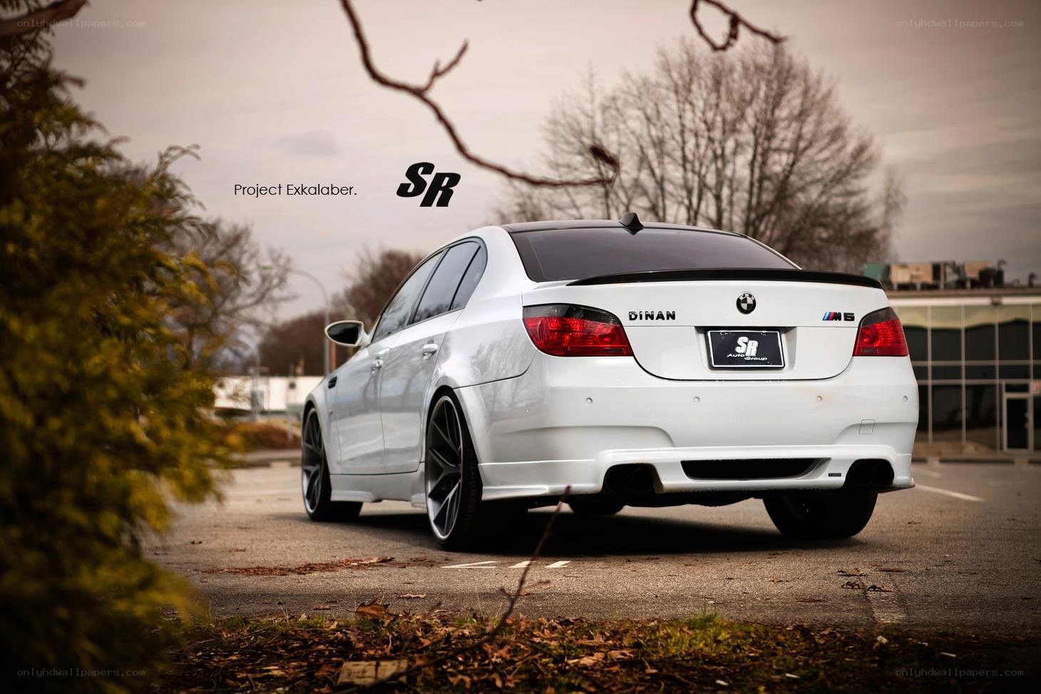 white bmw m5 sedan