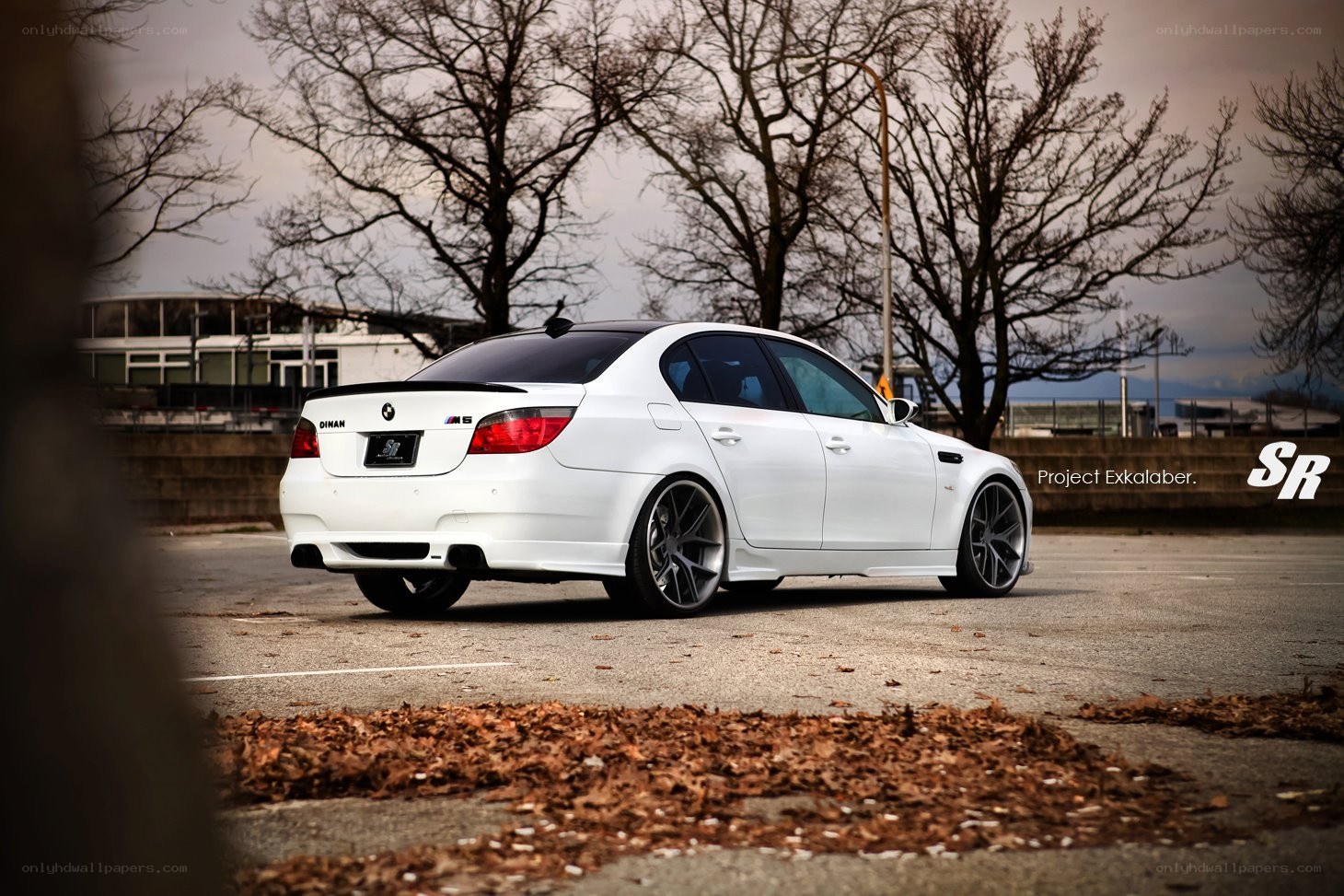 white bmw m5 sedan