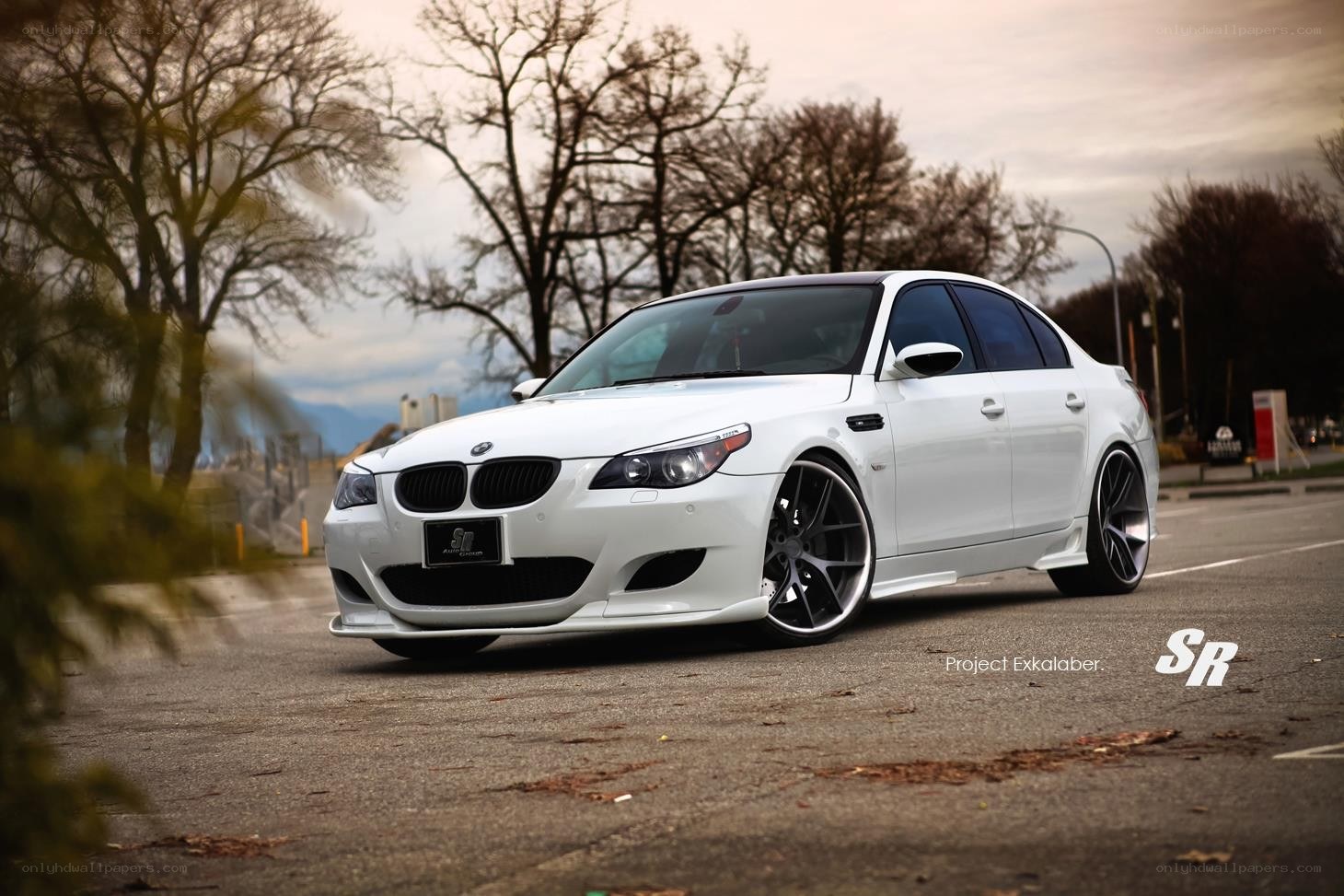 white bmw m5 sedan
